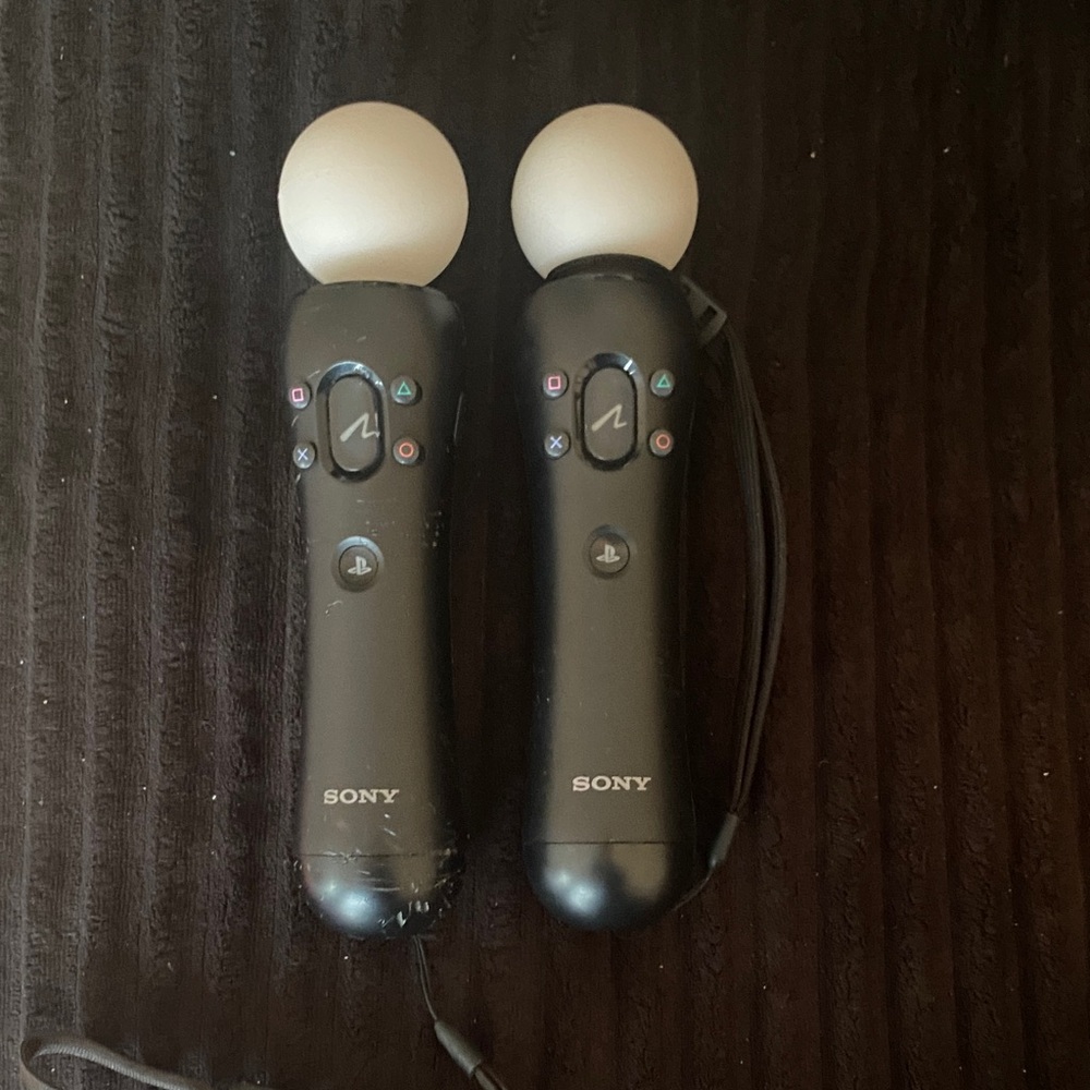 Sony Black Motion Controllers with White Spheres